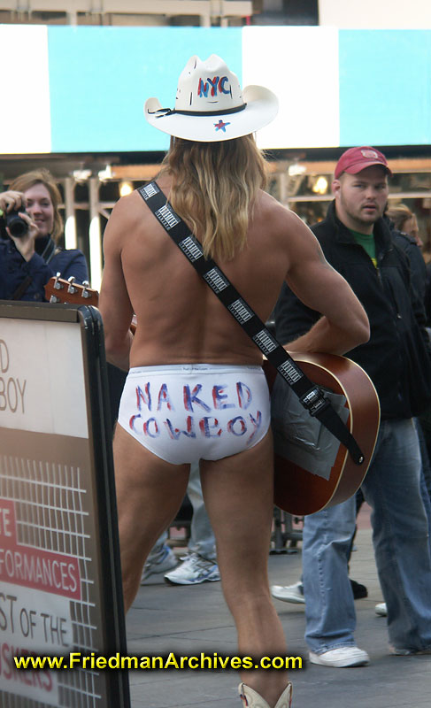street performer,guitar player,naked cowboy,busker,